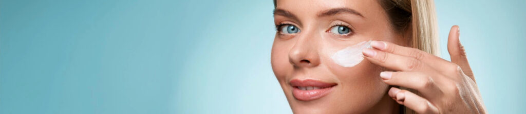 Woman Applying Eye Cream